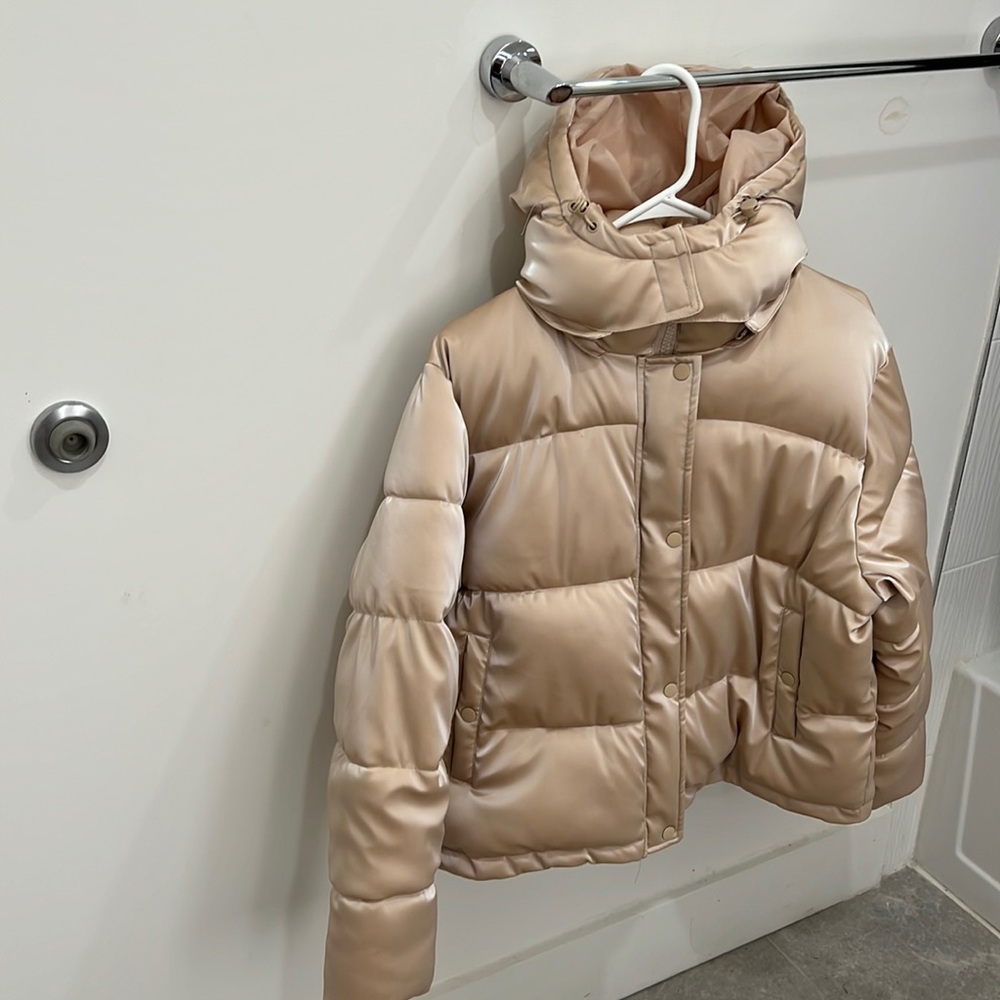 Puffy tan jacket, friend forever 21, size of jacket medium.
